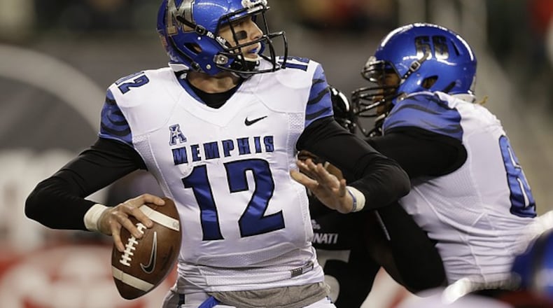 Memphis quarterback Paxton Lynch passes against Cincinnati in the first half Saturday, Oct. 4, 2014, in Cincinnati. (Associated Press)