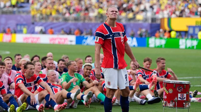 Norway's Erling Haaland (9) leads the team as they participate in a viking boat row after the World Cup round of 16 soccer match between Brazil and Norway in East Rutherford, N.J., near New York, Sunday, July 5, 2026. (AP Photo/Frank Franklin II)