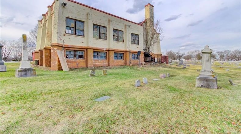 An abandoned church and cemetery is for sale in Dayton, Ohio. (Photo courtesy Realtor.com)