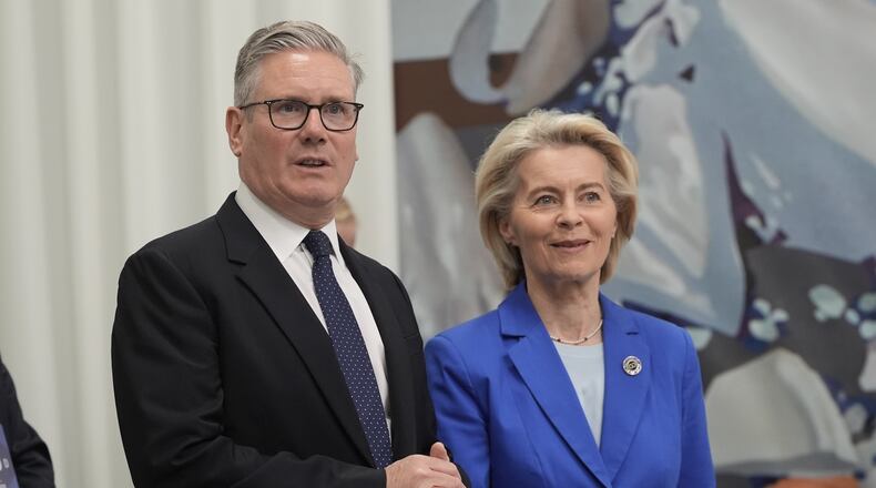 Britain's Prime Minister Keir Starmer, left, and President of the European Commission Ursula von der Leyen attend the European Political Community summit in Yerevan, Armenia, Monday May 4, 2026. (Stefan Rousseau/Pool Photo via AP)