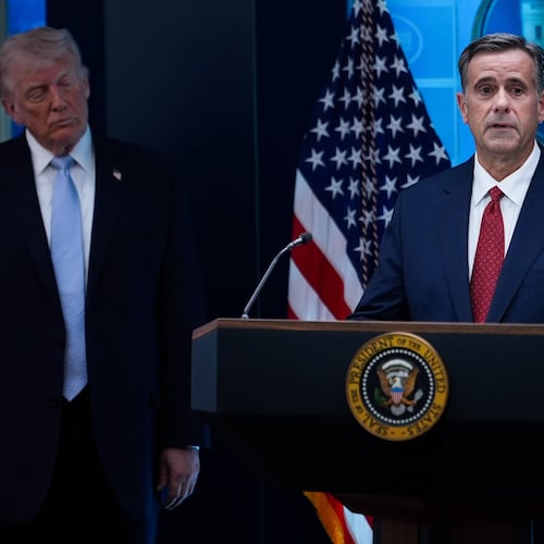FILE - CIA Director John Ratcliffe, accompanied by President Donald Trump, speaks with reporters in the James Brady Press Briefing Room at the White House in Washington, April 6, 2026, File)