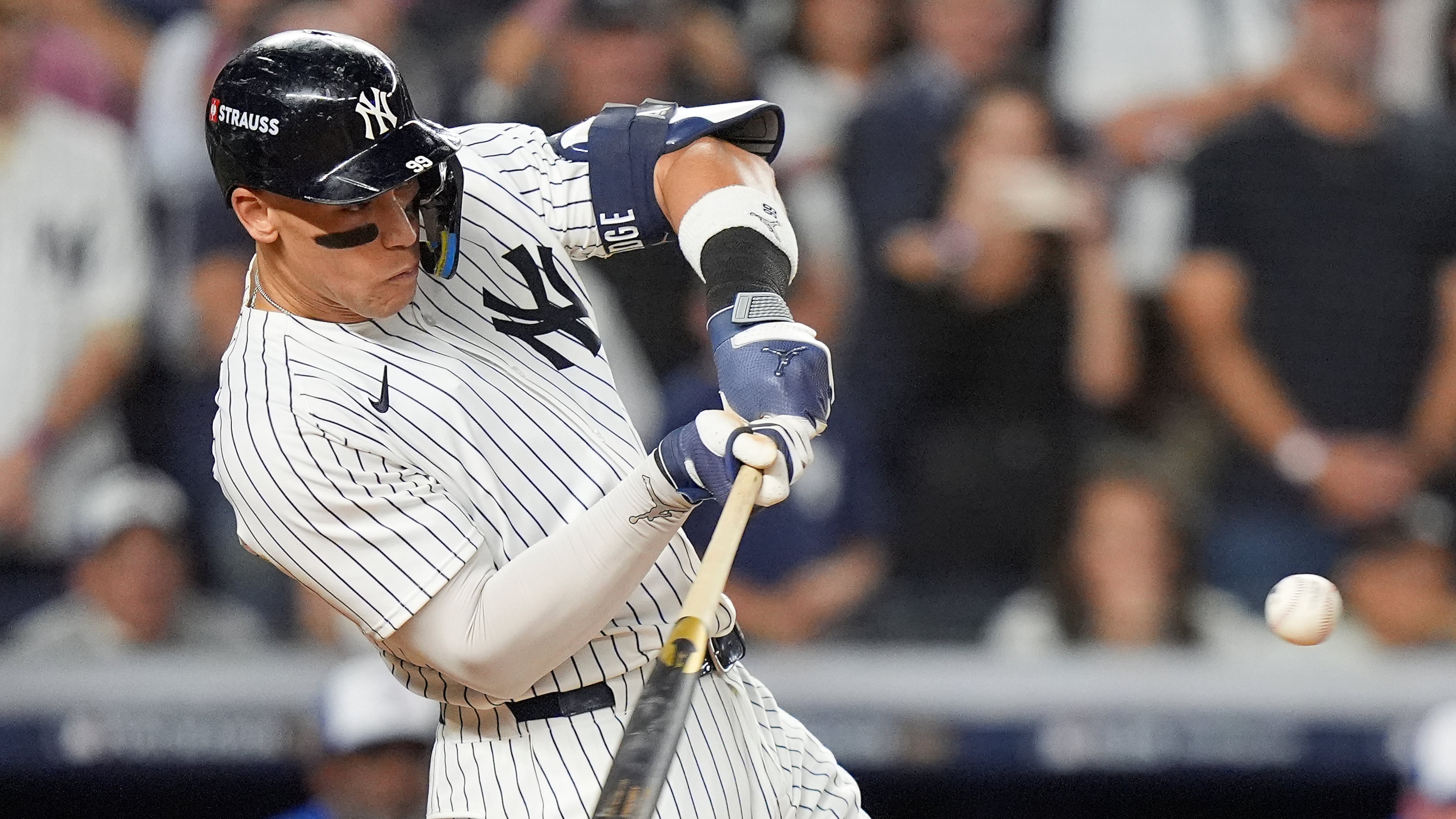 New York Yankees' Aaron Judge connects for a three-run home run against the Toronto Blue Jays during the fourth inning of Game 3 of baseball's American League Division Series, Tuesday, Oct. 7, 2025, in New York. (AP Photo/Frank Franklin II)