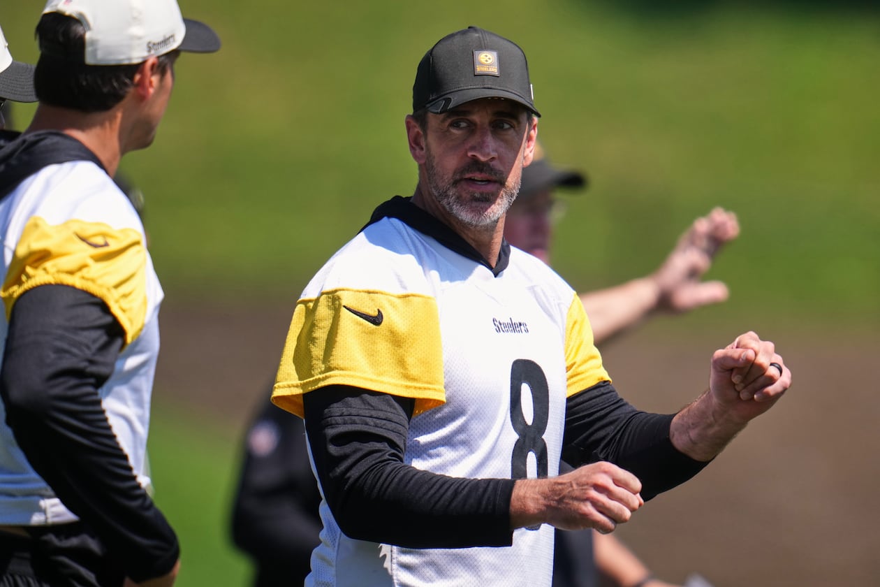 Pittsburgh Steelers quarterbacks Aaron Rodgers (8) and Mason Rudolph, left, discuss a play during the team's NFL football training camp in Latrobe, Pa., on Friday, July 31, 2026. (Gene J. Puskar/AP)