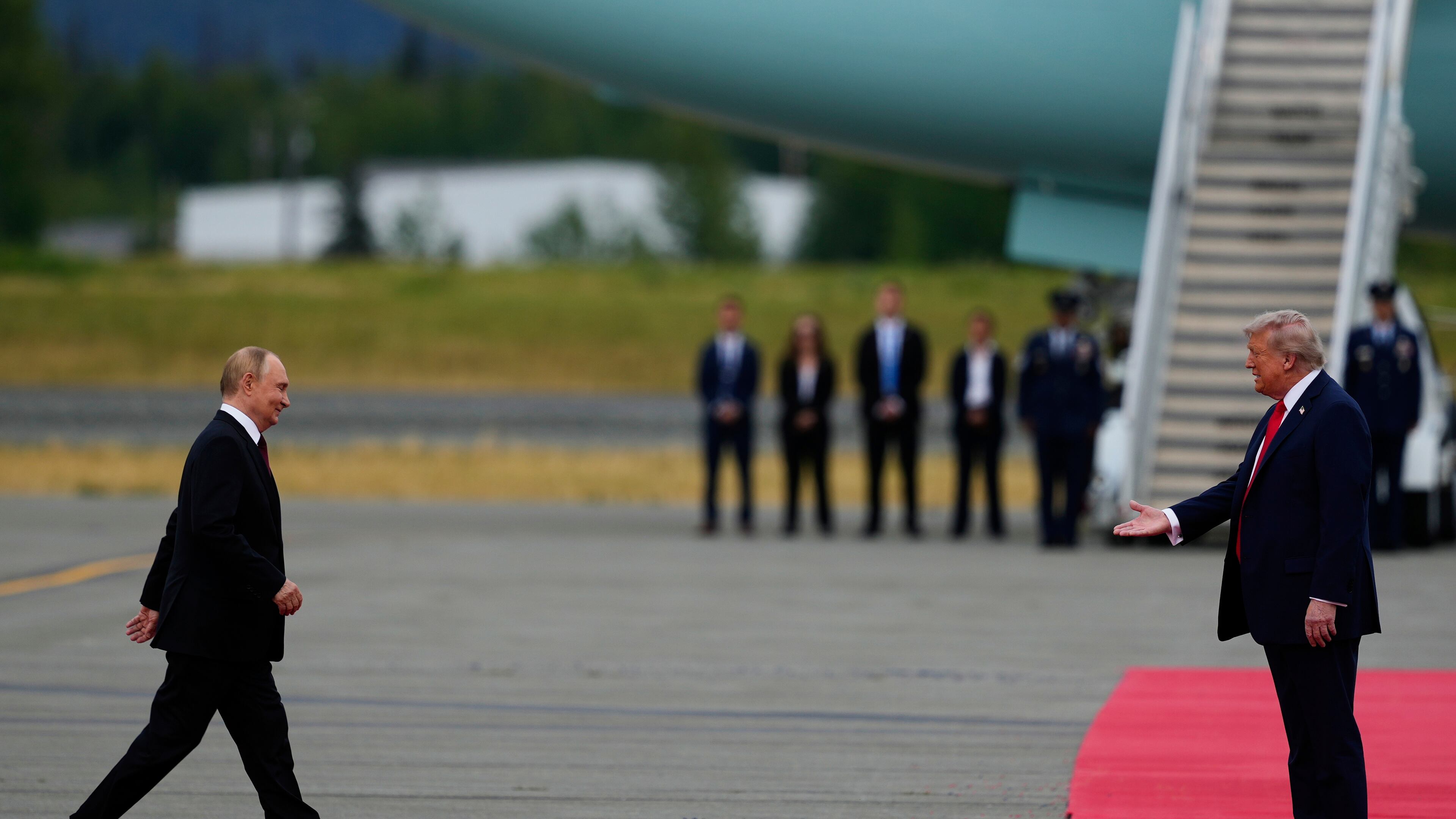 President Donald Trump greets Russia's President Vladimir Putin Friday, Aug. 15, 2025, at Joint Base Elmendorf-Richardson, Alaska. (AP Photo/Julia Demaree Nikhinson)