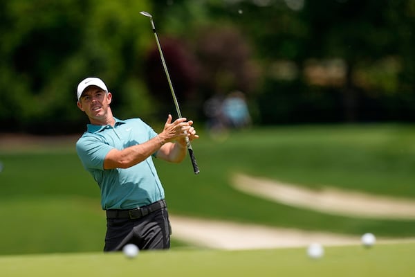 Rory McIlroy, of Northern Ireland, chips to the green on the 11th hole during a practice round for the PGA Championship golf tournament at the Quail Hollow Club, Wednesday, May 14, 2025, in Charlotte, N.C. (AP Photo/David J. Phillip)