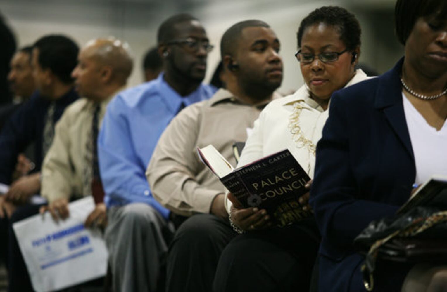 Job hunters line up at career fair