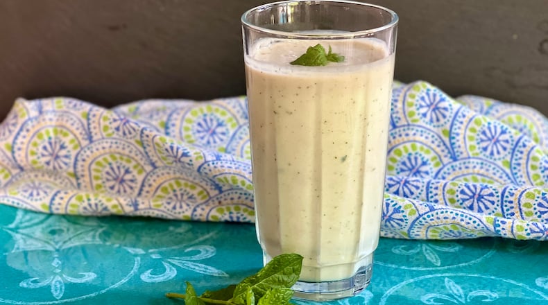 Cucumber adds fresh summer flavors to your favorite breakfast smoothie, and more. For this smoothie, fresh mint is as essential as the cucumber itself. (Kellie Hynes for The Atlanta Journal-Constitution)
