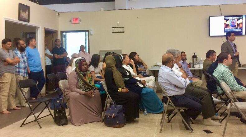 About 80 people gathered Saturday at a small mosque in Johns Creek to discuss policing and the death of a 36-year-old Somali-born woman who was killed when she was wandering her subdivision during an apparent mental breakdown in a confrontation with police officers. (Photo by Bill Torpy / AJC)