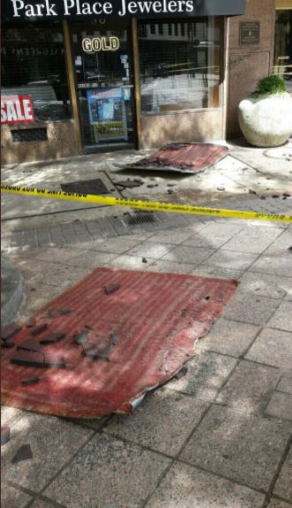 A metal tile fell from a 32-story building on Peachtree Street in Atlanta. (Credit: Channel 2 Action News)