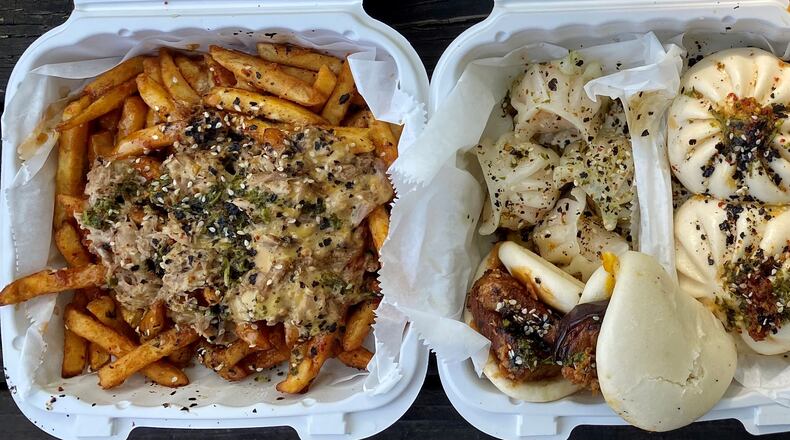 Mushi Ni’s serves Asian-American fusion food, such as duck fries; steamed buns and dumplings; and chop suey rice box with a fried egg. Wendell Brock for The Atlanta Journal-Constitution