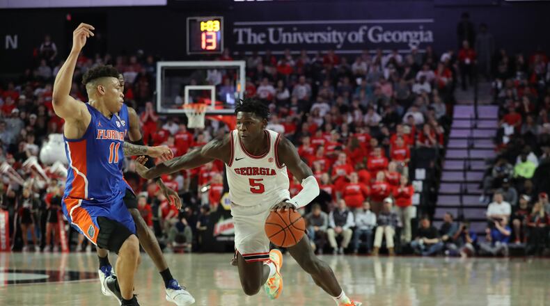 Georgia guard Anthony Edwards drives past Florida forward Keyontae Johnson Wednesday, March 4, 2020, in Athens. One of his final games with the Bulldogs. (Curtis Compton ccompton@ajc.com)