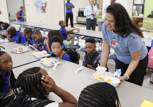 August 12, 2019 — On the first day of school, Atlanta Public Schools Superintendent Meria Carstarphen visited Tuskegee Airmen Global Academy, a new school building, and had breakfast with the students. Carstarphen did a short stint on the board of the Development Authority of Fulton County and argued repeatedly that tax rate cuts for luxury development projects squeezed Atlanta’s schools of potential dollars. (Bob Andres / robert.andres@ajc.com)