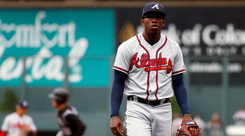 Braves pitcher Tyrell Jenkins reacts after giving up a three-run home run to Colorado Rockies' Nolan Arenado in the first inning Sunday. The Braves lost for the eighth time in 10 games since the All-Star break. (AP photo)