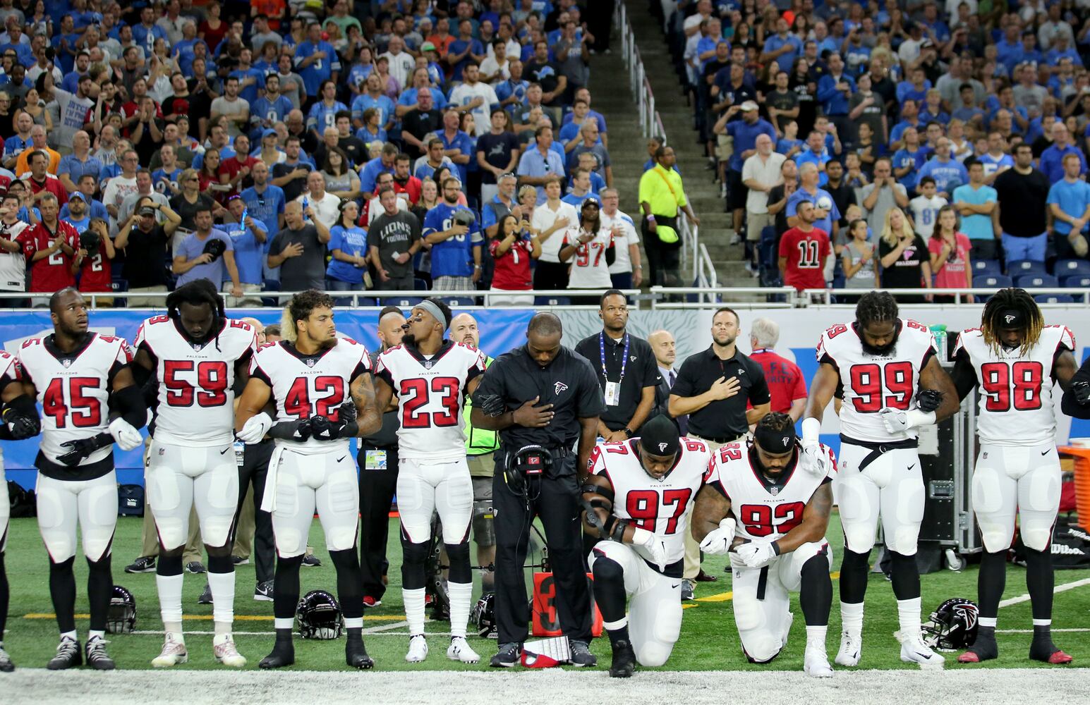 Photos: Falcons show solidarity during National Anthem