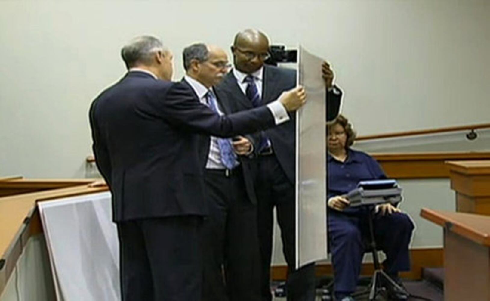 Neuman trial opens