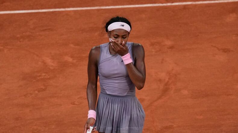 Coco Gauff of the U.S. reacts after the third round women's singles tennis match against Anastasia Potapova of Austria at the French Open tennis tournament in Paris, Saturday, May 30, 2026. (AP Photo/Christophe Ena)
