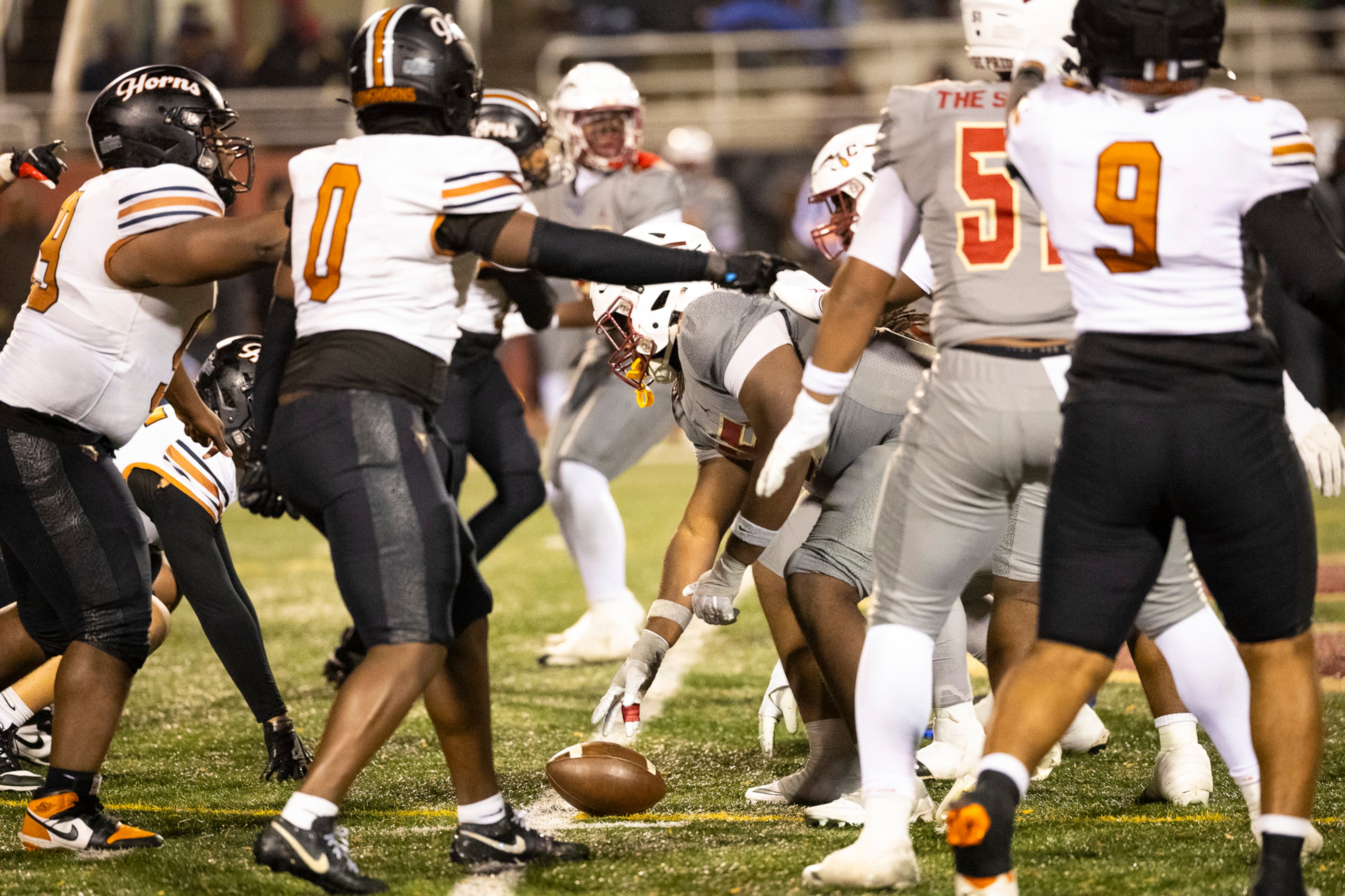Creekside and Kell players get in formation during the second half of the class 4A semifinal at Creekside High School in Fairburn, GA on Friday, December 5, 2025. (Oscar Guevara Saenz for the AJC)