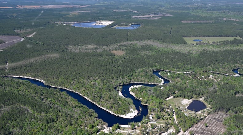 An aerial photograph shows the St. Marys River dividing the border of Georgia and Florida on Tuesday, March 19, 2024. (Hyosub Shin/AJC)