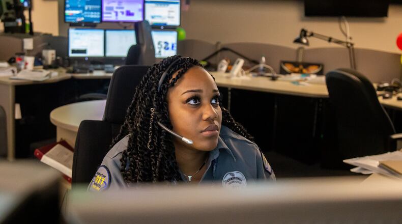 Dispatch operator Kelah Handley answers calls at a Sandy Springs 911 call center on Wednesday, April 17, 2019. STEVE SCHAEFER / SPECIAL TO THE AJC
