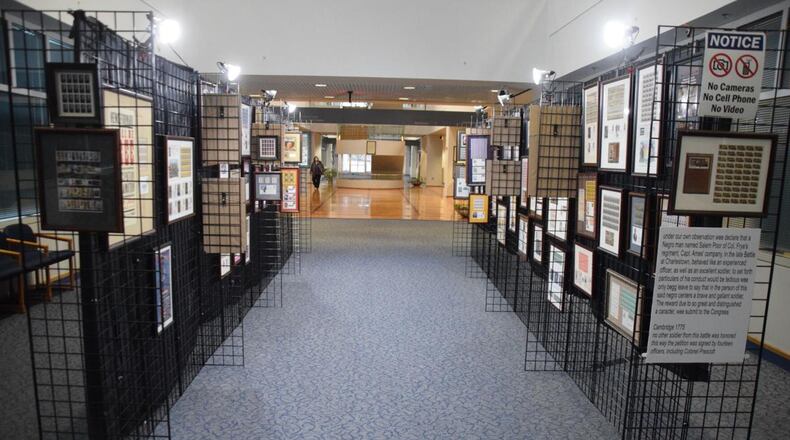 Mike Glenn's Black History stamp collection is part of Gwinnett County's Black History Month exhibit at the Gwinnett Justice and Administration Center. (Courtesy of Curt Yeomans)