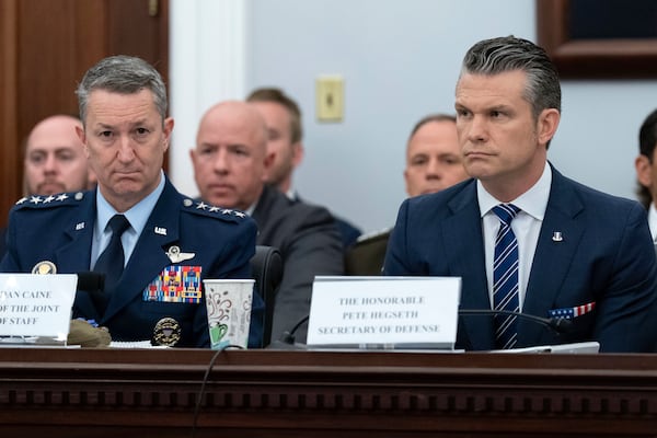 The Chairman of the Joint Chiefs of Staff General Dan Caine, left, and Department of Defense Secretary Pete Hegseth testify before the House Committee on Appropriations subcommittee oversight hearing on the Department of Defense, on Capitol Hill in Washington, Tuesday, June 10, 2025. (AP Photo/Jose Luis Magana)