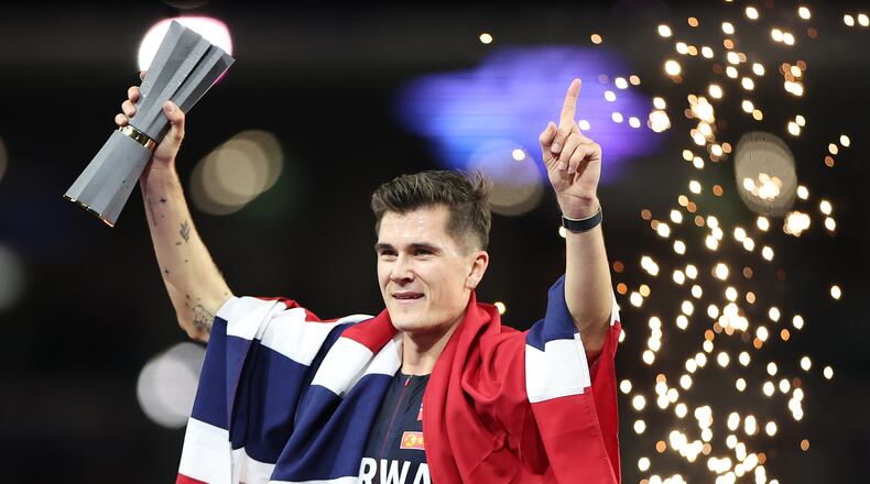 Jakob Ingebrigtsen, of Norway, celebrates winning the men's 5,000 meters final during the World Athletics Ultimate Championship in Budapest, Hungary, Friday, Sept. 11, 2026. (AP Photo/Armin Durgut)
