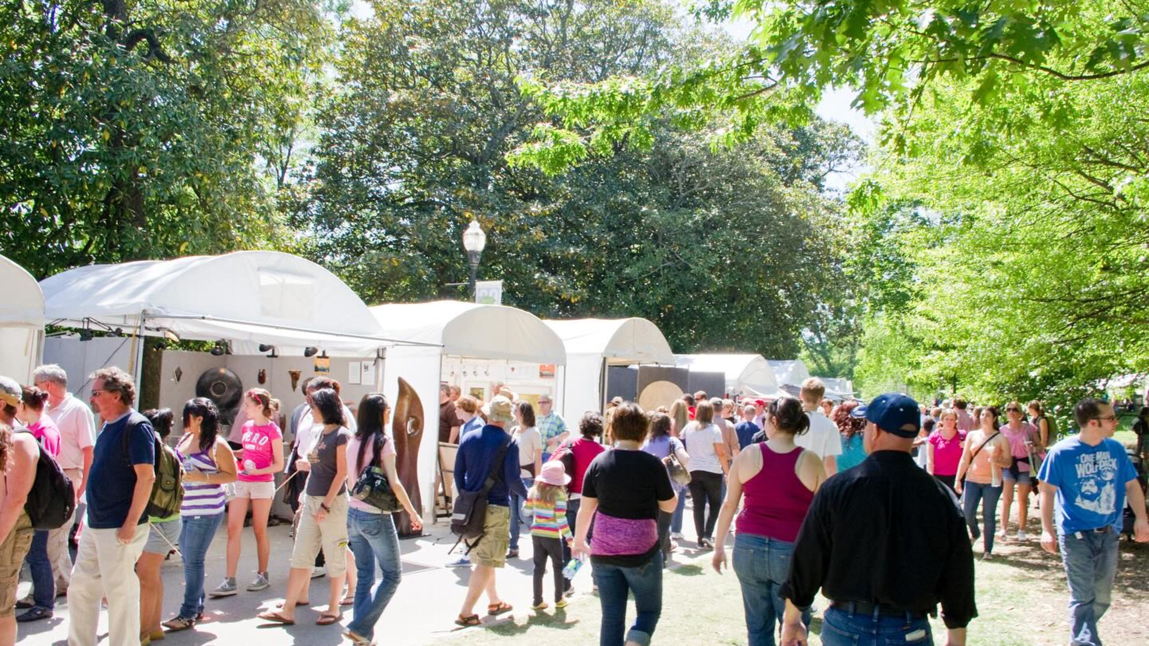 The expansive Atlanta Dogwood Festival draws crowds to Piedmont Park each year to shop for art, enjoy live performances and more.