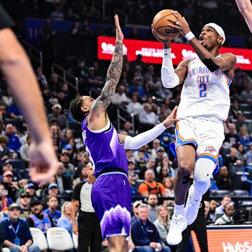 Oklahoma City Thunder guard Shai Gilgeous-Alexander (2) shoots against Utah Jazz during the first half of an NBA basketball game, Wednesday, Jan. 7, 2025, in Oklahoma City. (AP Photo/Gerald Leong)