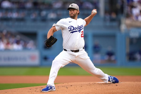 Los Angeles Dodgers starting pitcher Clayton Kershaw throws to the plate during the first inning of a baseball game against the Los Angeles Angels, Saturday, May 17, 2025, in Los Angeles. (AP Photo/Mark J. Terrill)