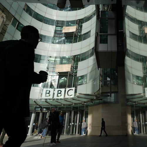 FILE - Pedestrians walk outside the BBC Headquarters in London, Wednesday, Nov. 12, 2025. (AP Photo/Kin Cheung, file)