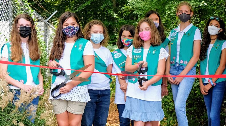 Decatur Junior Girl Scouts Troop 16307 earn Bronze Award by planting a zoo garden at Frazier-Rowe Park. (Pictured L-R: Lucy Hutcheson, Hannah Hughes, Cara Mullins, Mallory Harry, Norah Fonder-Kristy, Kate Morris, Claire McEnaney and Samantha Hill).