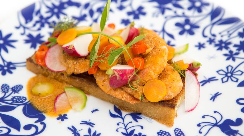 Chef Todd Richards’ first cookbook “Soul” includes family stories and such recipes as Shrimp Hot Chicken Style. (Jenni Girtman / Atlanta Event Photography)