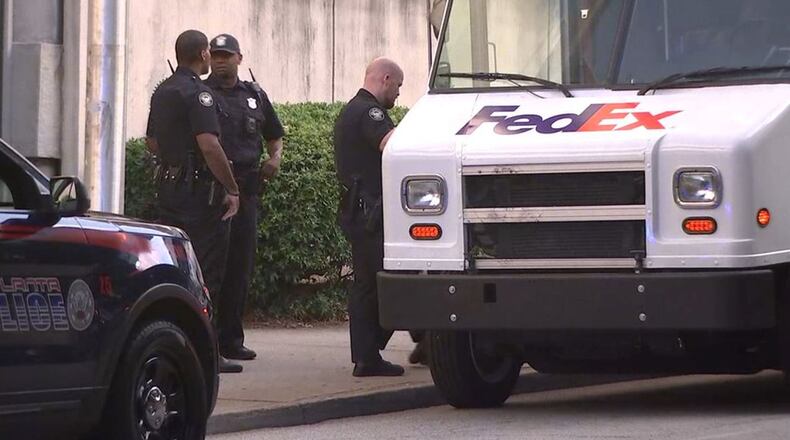 Three people who had been shot were taken to Grady Memorial Hospital in a FedEx truck after flagging down the driver, police said.