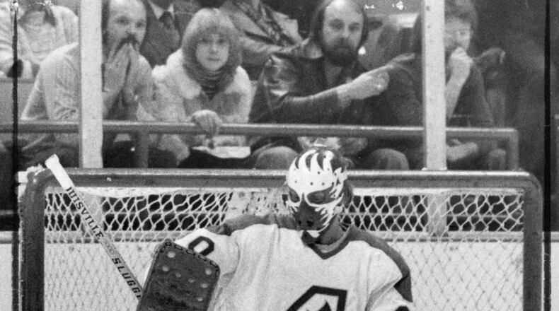 The puck stops with Dan Bouchard in this 1976 game at The Omni. (Bud Skinner / AJC)