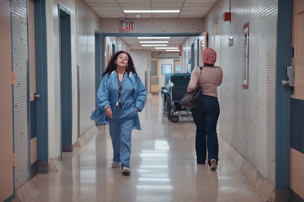 Medical staff walk through a hallway at Brookdale University Hospital and Medical Center on Tuesday, July 1, 2025, in the Brooklyn borough of New York. (AP Photo/Andres Kudacki)