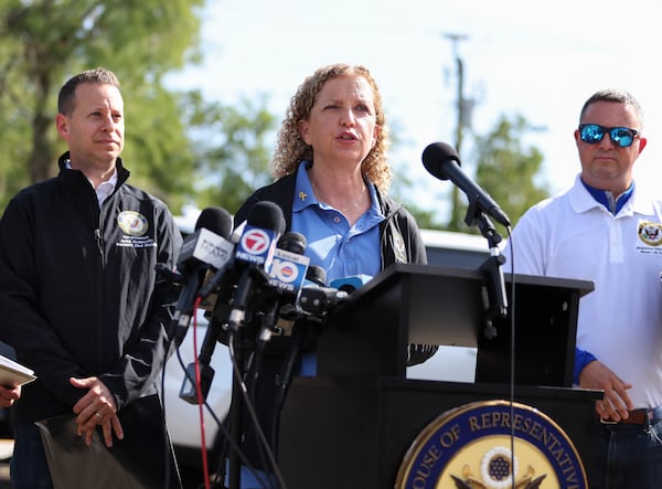 Rep. Debbie Wasserman Schultz speaks outside the migrant detention facility dubbed "Alligator Alcatraz" during a news conference ahead of a tour of the Dade-Collier Training and Transition Facility, Saturday, July 12, 2025, in Ochopee, Fla. (AP Photo/Alexandra Rodriguez)