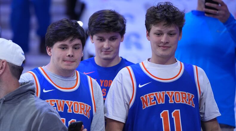 New York Knicks' fans watch warm-ups before Game 3 in a second-round NBA basketball playoff series against the Philadelphia 76ers Friday, May 8, 2026, in Philadelphia. (AP Photo/Matt Slocum)