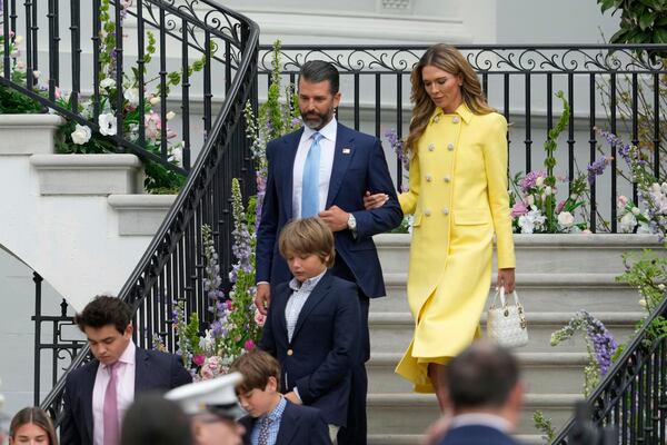 Donald Trump Jr., and his girlfriend Bettina Anderson arrive for the White House Easter Egg Roll on the South Lawn of the White House, Monday, April 21, 2025, in Washington. (AP Photo/Alex Brandon)