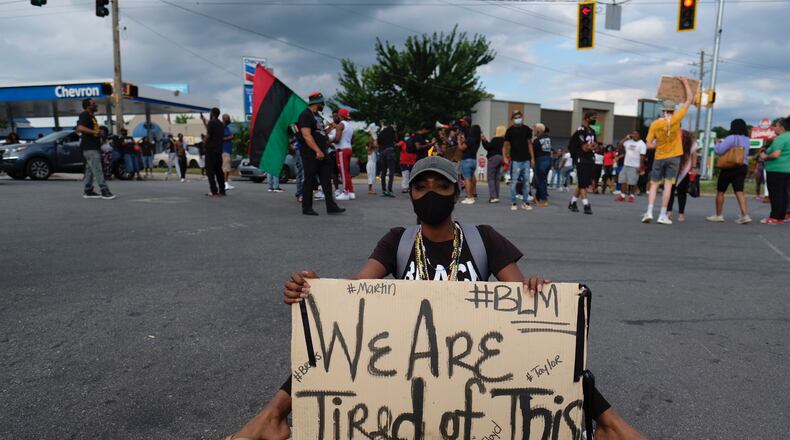 June 17, 2020 - Atlanta - Protestors block traffic on University Avenue in Atlanta, near the Wendy’s where Rayshard Brooks was shot and killed. Ben Gray for the Atlanta Journal Constitution