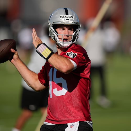 FILE - Las Vegas Raiders quarterback Fernando Mendoza throws during the NFL football team's practice Wednesday, June 10, 2026, in Henderson, Nev. (AP Photo/John Locher)