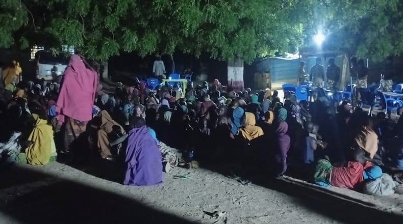 In this photo released by Nigerian Army, freed women and children that were abducted by Boko Haram in southern Borno, Nigeria. Saturday, June 6, 2026. (Nigerian Army via AP)