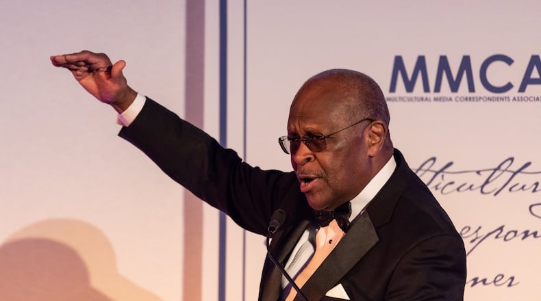 Herman Cain, former host on WSB Radio, speaking at the National Press Club in Washington, D.C. last May. (Photo by Cheriss May/Sipa USA/TNS)