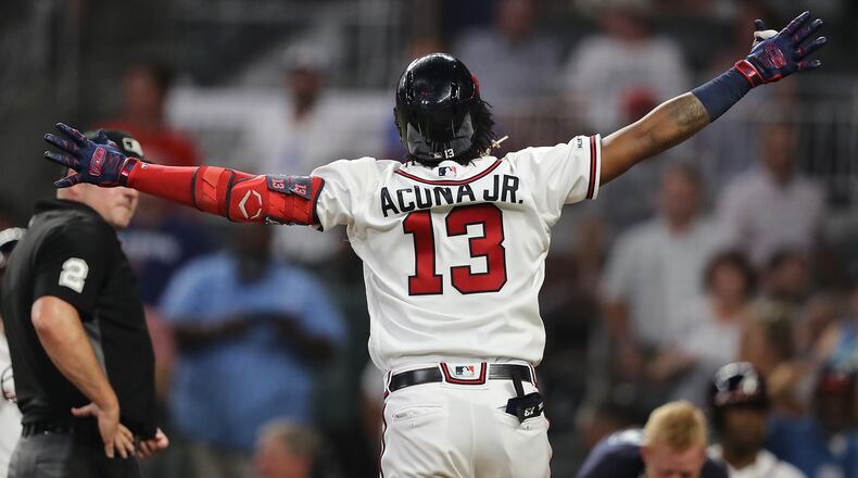 Atlanta Braves' Ronald Acuna Jr. heads home hitting his 34th home run of the season during the fourth inning against the New York Mets to take a 4-1 lead with the solo shot in a MLB baseball game on Tuesday, August 13, 2019, in Atlanta.   Curtis Compton/ccompton@ajc.com