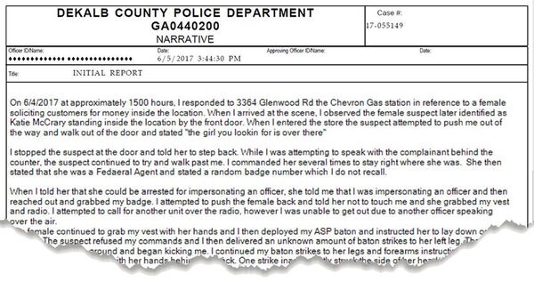 Detail of the narrative portion of the police report filed in the convenience store altercation. DeKalb police redacted the officer's name before they released the report to the public. He was later identified as Officer P.J. Larscheid.