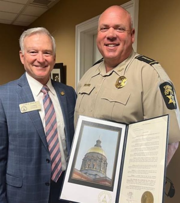 Banks County Sheriff Billy Carlton Speed, right, received a resolution from the Georgia House of Representatives in 2023 recognizing his service. Speed was the Georgia Sheriffs' Association 2023 Sheriff of the Year. He's pictured with state Rep. Chris Erwin, a Republican from Homer who sponsored the resolution. Photo credit: Banks County Sheriff's Office.