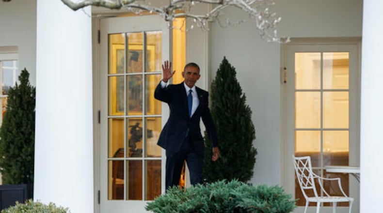 President Barack Obama waves as he leaves the Oval Office at the White House in Washington, Friday, Jan. 20, 2017. (AP Photo/Evan Vucci)