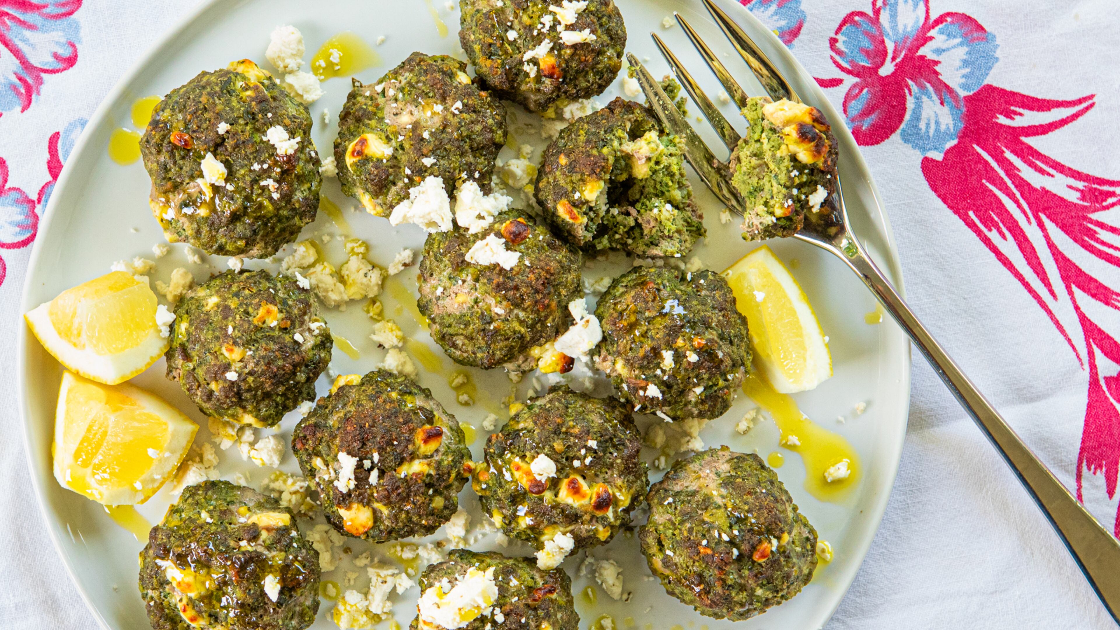 Spanakopita meatballs use the high amount of water in spinach to advantage. (Aaliyah Man for The Atlanta Journal-Constitution/Food styling by Kate Williams)