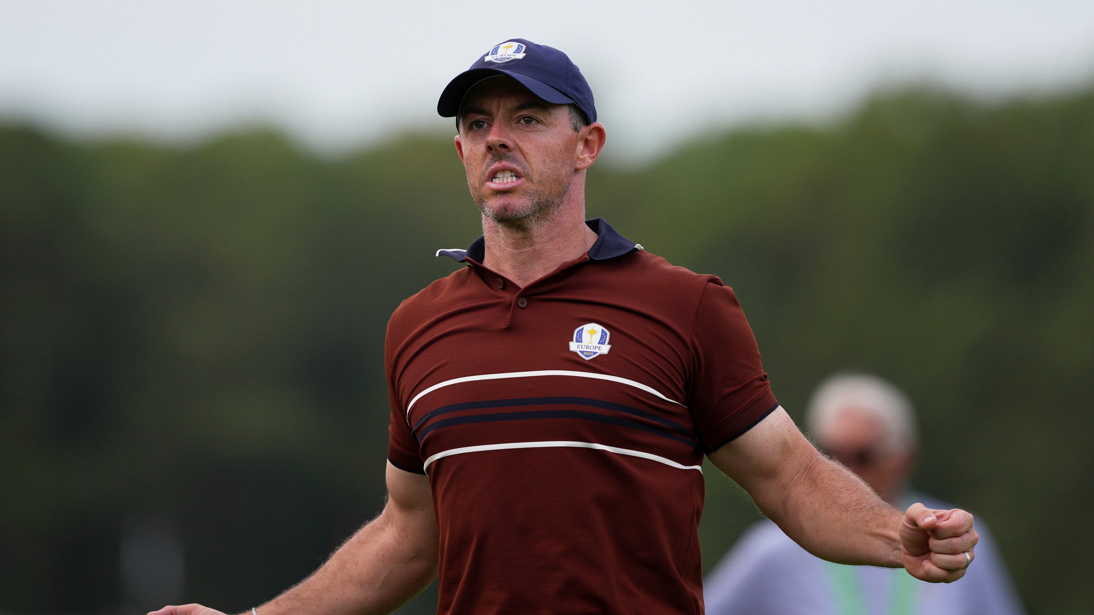 Europe's Rory McIlroy celebrates after a putt on the 14th hole at Bethpage Black golf course during the Ryder Cup golf tournament, Saturday, Sept. 27, 2025, in Farmingdale, N.Y. (AP Photo/Matt Slocum)