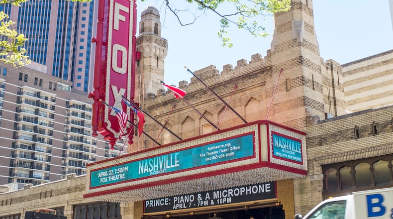 The Fox Theatre marquee still advertised the Prince shows Thursday afternoon, but don't show up or you'll be very lonely! Ben Gray / bgray@ajc.com