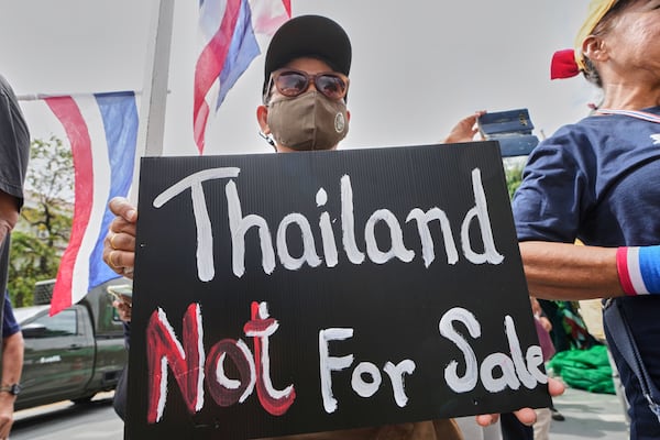 Anti-government protesters gather in front of Government house demanding Thailand's Prime Minister Paetongtarn Shinawatra resign in Bangkok, Thailand, Thursday, June 19, 2025, (AP Photo/Sakchai Lalit)